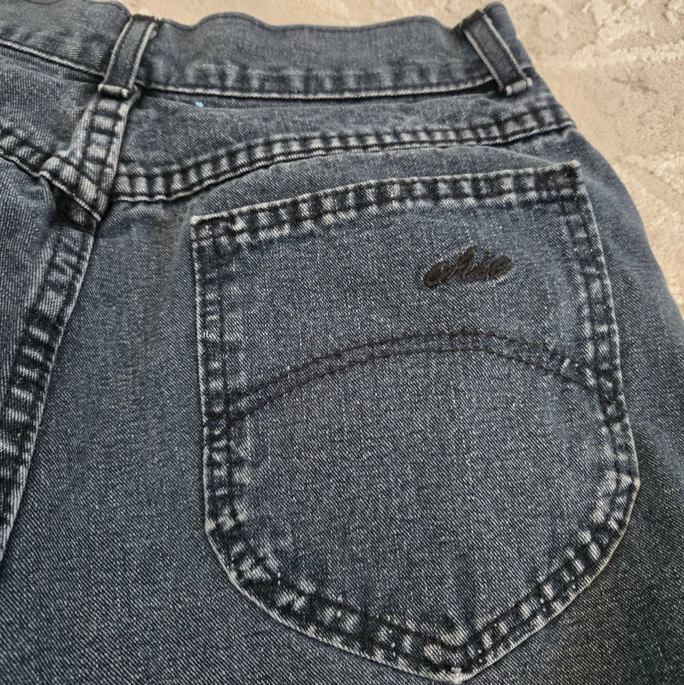 Vintage 1990s Chic Black Denim Long Shorts